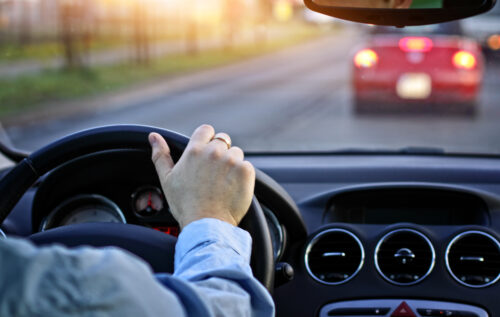 person driving on the road